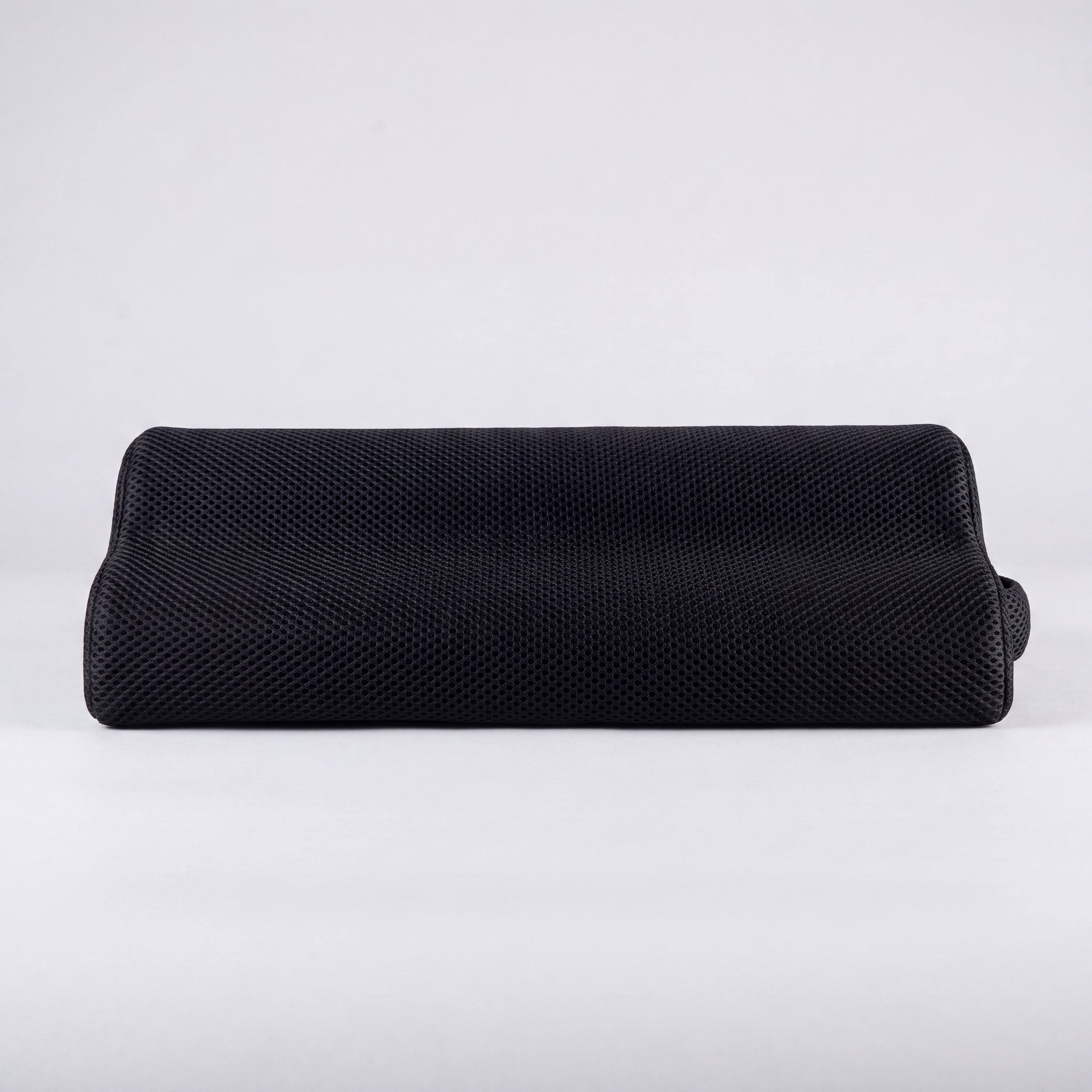 Repose-pieds ergonomique en mousse à mémoire de forme noir, vue de face