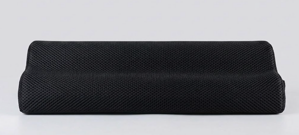 Repose-pieds ergonomique en mousse à mémoire de forme noir, vue de face