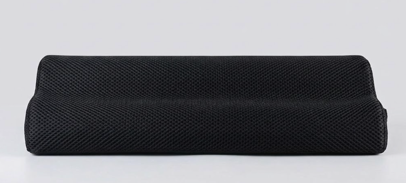 Repose-pieds ergonomique en mousse à mémoire de forme noir, vue de face